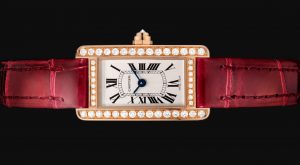 The 18k rose gold fake watch is decorated with diamonds.