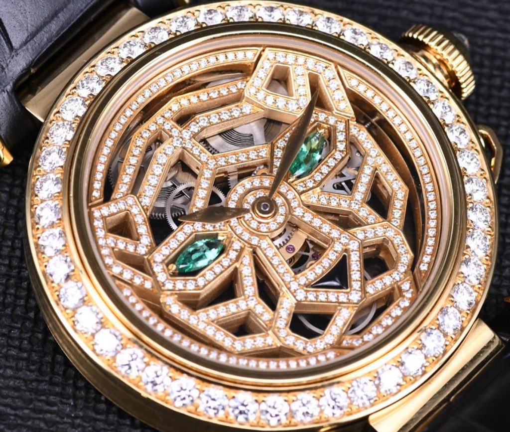 The 18k gold fake watch is decorated with diamonds.