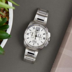 The 42mm replica watch has a white dial.